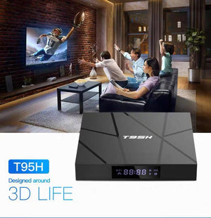 A family on a couch watches a 3D football game on TV, reaching out as if interacting with the screen; an Android TV Box SpyCam is displayed in the foreground.