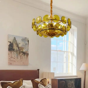 A bedroom featuring an Italian Retro Pendant Light, a sunlit window, a bed with cushions, a wall painting, and a floor lamp.