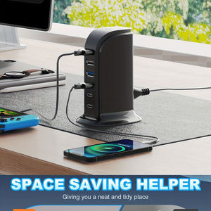 The SpyCam Charger Hub (USB & Type-C Ports) sits on a desk, charging a smartphone and other devices while discreetly monitoring your home—“SPACE SAVING HELPER” displayed below.