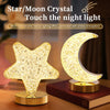 Star- and moon-shaped Crystal Table Lamps provide warm yellow illumination from elegant wooden bases, arranged on a dark surface beside a book. These bedside lamps, named “Crystal Table Lamp,” offer convenient touch control for effortless brightness adjustment. A text overlay highlights the product’s key features.