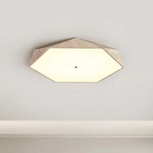 The Natural Stone Ceiling Light features a hexagonal design with a beige frame, mounted on a plain white ceiling, glowing warmly and centered in the image.