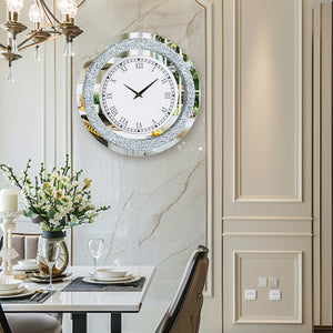 A dining room features a set table, floral centerpiece, and the Modern Luxury Roman Numerals Wall Clock on a marble-patterned wall.