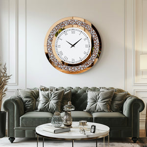 A Modern Luxury Roman Numerals Wall Clock hangs above a tufted gray sofa in a stylish, modern living room featuring neutral tones and elegant decor.