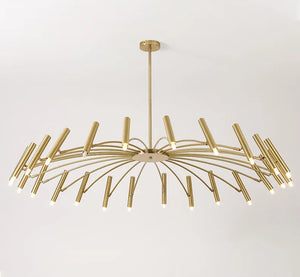 A large gold chandelier exuding elegance, hanging from a ceiling.