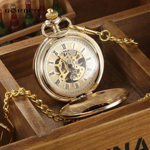 The Vintage Mechanical Pocket Watch with visible movement, Roman numerals, and an ornate chain is displayed in a wooden box.