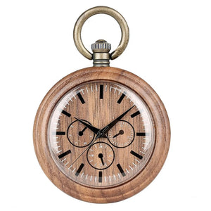 The Handmade Antique Vintage Pocket Watch is a custom bronze quartz walnut wooden pocket watch featuring black hour markers, three subdials, black hands, and a brass crown with a loop at the top.