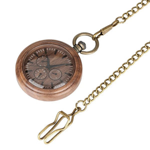 A Handmade Antique Vintage Pocket Watch, crafted from bronze quartz and walnut wood, features three small dials and comes attached to a brass chain with a clip.
