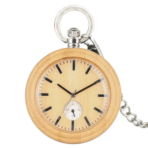 The Personalized Natural Minimalist Silver Bamboo Wood Pocket Watch Taschenuhr features black hour and minute hands, a small seconds dial, and a metal chain attached to the top.