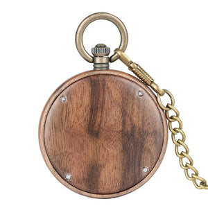 The Handmade Antique Vintage Pocket Watch is a custom bronze quartz walnut wooden pocket watch with a brass winding crown, attached brass chain, and four small metal screws on the wooden case.
