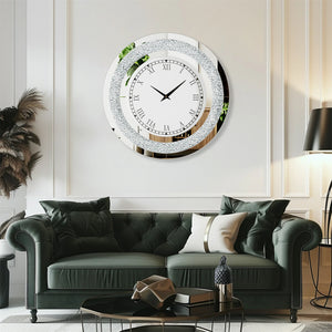 A Modern Luxury Roman Numerals Wall Clock hangs above a dark green tufted sofa in an elegantly decorated living room with modern accents.