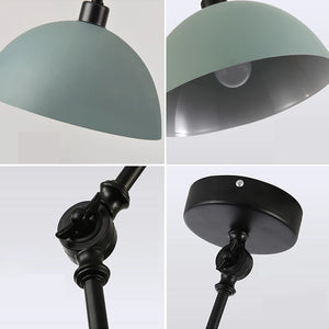 Close-up of the Zig Zag Pendant Light revealing its industrial design details, including the green dome lampshade's interior, switch, and ceiling mount. This pendant light stands out against a light background, showcasing its stylish functionality.