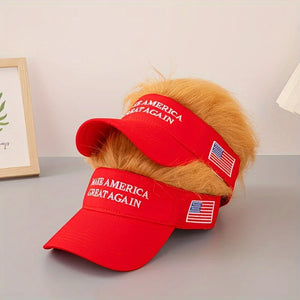 Two Visor Cap - Make America Great Again hats in red, each with white embroidered text, American flag patch, and attached faux blond hair, are displayed on a gray surface—a playful, patriotic conversation starter.