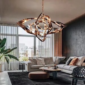 Modern living room with large windows, sectional sofa, round coffee table, indoor plant, and an Elegant Industrial Gallery Pendant hanging from the ceiling.