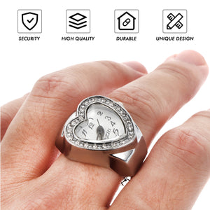 A close-up of a hand wearing the Sweetheart Ring Watch, a silver heart-shaped ring with a small clock face—shown under icons for security, high quality, durability, and unique design—an eye-catching and romantic accessory.