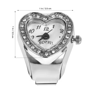 The Sweetheart Ring Watch is a silver heart-shaped accessory with sparkling rhinestones around the face, labeled "BOZHI," and measures 1 x 1 inch (2.5 x 2.5 cm)—a stylish and charming piece for any outfit.
