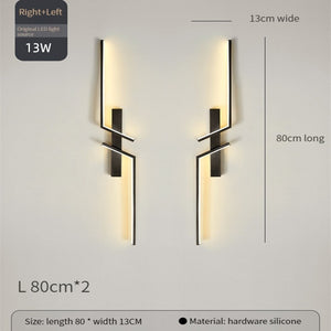 The Minimalist Wall Sconce features a geometric design, measuring 80cm long by 13cm wide. Made from hardware and silicone, each sconce has a modern look and uses an efficient 13W LED light source.