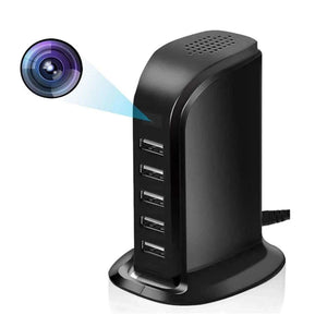 The SpyCam Charger Hub (5 USB Ports) is a black multi-port USB charger featuring a hidden HD spy camera at the top for WiFi real-time monitoring.