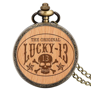 The Skeleton Pocket Watch features a vintage steampunk design with a wooden cover engraved "THE ORIGINAL LUCKY-13" and decorated with a skull and crossbones plus the number 13.