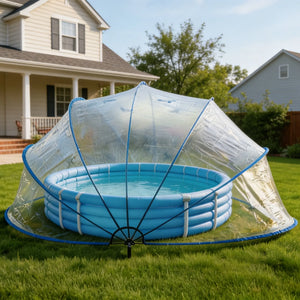 A round inflatable pool sits on a lawn in front of a suburban house, covered by a Large Outdoor Above Ground Pool Cover whose clear plastic material provides both protection and style.