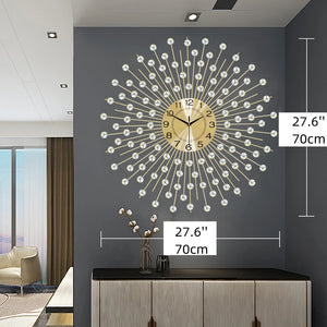 The Lux Radiance Starburst Wall Clock, featuring a 27.6-inch mid-century sunburst design, is mounted on a gray wall above a console with vases, creating a striking statement piece for your space.
