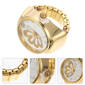 The Butterfly Ring Watch, an elegant gold wristwatch with a butterfly design, is missing its crown and has a damaged strap. Displayed from multiple angles, it resembles refined jewelry and evokes the charm of a butterfly ring watch.
