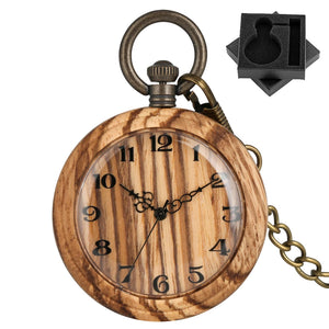 The Wooden Pocket Watch features black numerals and ornate hands on wood, paired with a bronze chain and black foam insert—an elegant choice for collectors who appreciate vintage-style pocket watches.