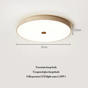 Bring refined beauty to your space with the Natural Stone Ceiling Light, crafted with a round travertine body and complemented by a tempered glass lampshade. Its full spectrum LED light source offers vibrant illumination while embodying the wabi-sabi philosophy through its organic texture and understated elegance. Dimensions: 37 cm wide, 5.5 cm high.