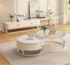 A living room featuring the Luxury Round Coffee Table Set and a TV console, each marked with dimensions in centimeters. The minimalist coffee table and white furniture add elegance atop a gray rug.