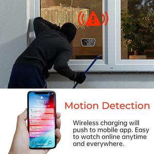 Burglar attempting to break into a house, unaware of the discreet monitoring by a Clock Charger SpyCam with iPhone & Android support, alerting on a smartphone.