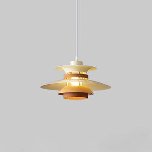 A Scandinavian pendant light made of natural wood, hanging from the ceiling.