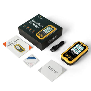 A yellow and black Nuclear Radiation Detector with a manual and charging cable.
