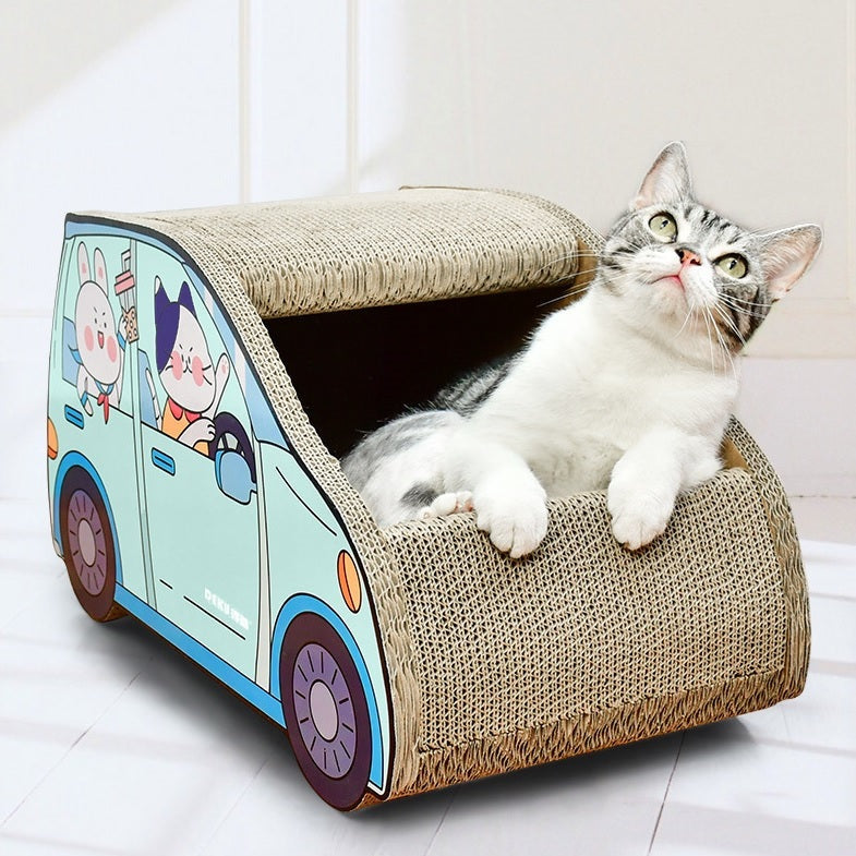 Gray and white cat relaxing inside a SmartSUV™ Cat Car, complete with cartoon animal stickers on the sides.