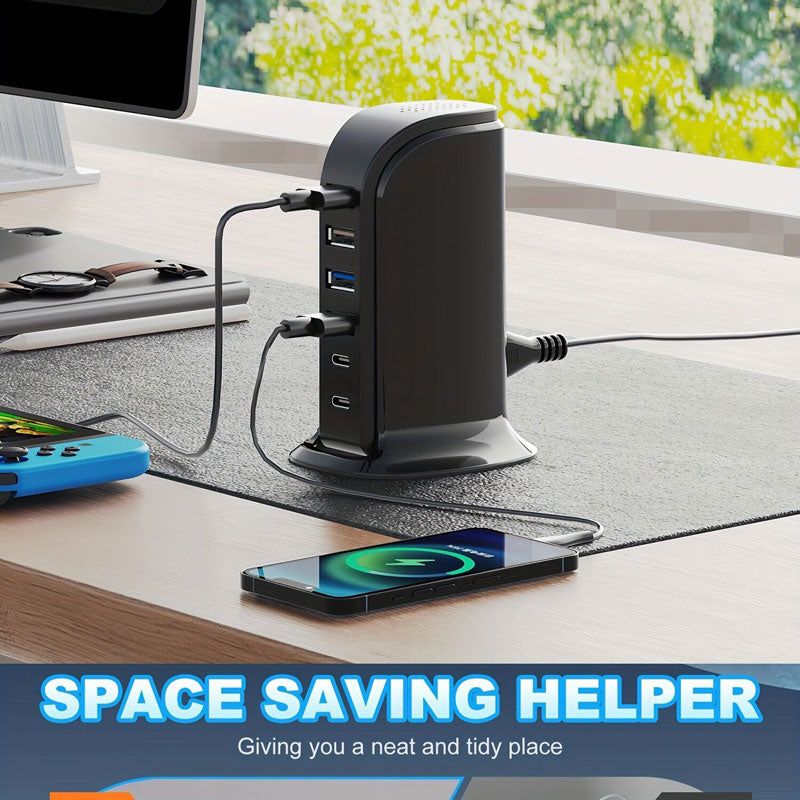 The SpyCam Charger Hub (USB & Type-C Ports) sits on a desk, charging a smartphone and other devices while discreetly monitoring your home—“SPACE SAVING HELPER” displayed below.