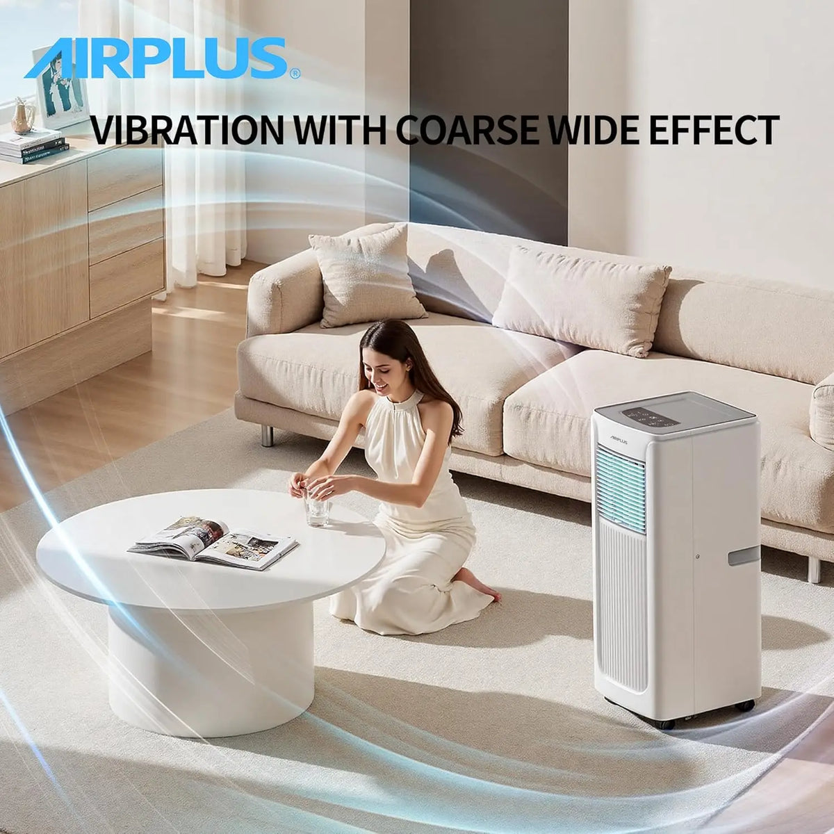 A woman in a white dress sits on the floor by a round coffee table, with the Powerful Air Conditioner nearby in a modern living room designed for Modern Homes. Text reads "POWERFUL COOLING WITH COARSE WIDE EFFECT.