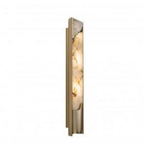 The Luxury Marble Wall Sconce showcases a vertical design with a gold metal frame and a translucent marbled glass panel, beautifully illuminated from within.