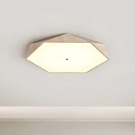 The Natural Stone Ceiling Light features a hexagonal design with a beige frame, mounted on a plain white ceiling, glowing warmly and centered in the image.