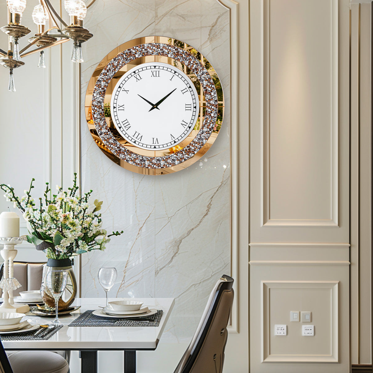 The Modern Luxury Roman Numerals Wall Clock hangs on a marble-patterned wall in a modern dining room with a set table and floral centerpiece.