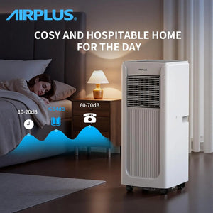 A woman sleeps in bed beside a lit nightstand lamp and a white Powerful Air Conditioner with tower design on the floor, ideal for modern homes, as noise level graphics are displayed.