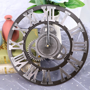 The Retro Gear Wall Clock, featuring a round design with Roman numerals and intricate gear motifs, is displayed on a table alongside books and a small vase in the background.