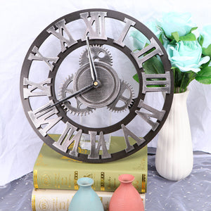 A Retro Gear Wall Clock embellished with Roman numerals and gear motifs rests on top of books. Beside it, a white vase filled with blue flowers, alongside two small vases, decorates the polka dot cloth, forming a harmonious scene.