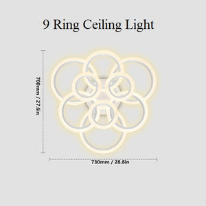 The Smart Circle Ceiling Light, featuring a 9-ring overlapping circular design and measuring 700mm in height by 730mm in width, is displayed on a gray background with labeled dimensions. This ceiling light offers adjustable brightness to match any mood or setting.