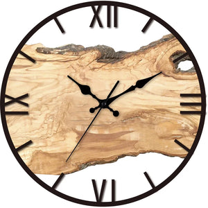 Introducing the Wood Circular Wall Clock, a handcrafted timepiece featuring Roman numerals and black hands. It exudes an organic style with its uniquely decorative uneven wooden background.