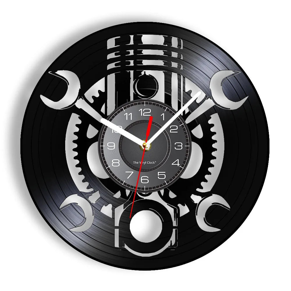 Introducing the Black Record Wall Clock, a rustic industrial timepiece meticulously crafted from a vinyl record and featuring an intricate gear and wrench design.