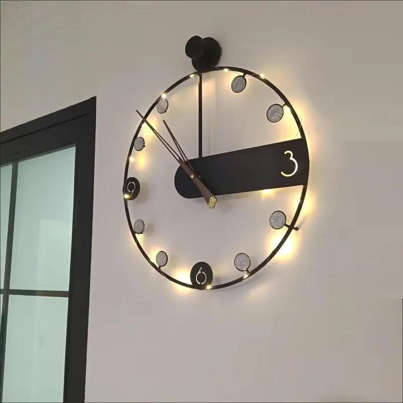 A living room with a modern Round Ring Wall Clock on the wall with tiny lights around the ring.