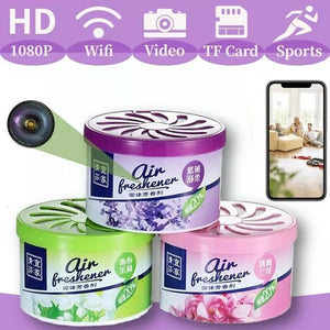 Three air freshener containers with various scents are displayed next to an image of the Fake Decorative Display SpyCam, which boasts HD 1080P resolution, WiFi connectivity, video recording, TF card storage, and sports functions that you can view on a mobile phone. This high-tech surveillance tool is designed to blend in perfectly with its surroundings.