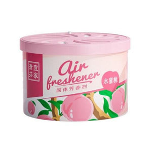 The Fake Decorative Display SpyCam is a round pink container of air freshener adorned with images of peaches and leaves on the label, featuring the text "Air Freshener" along with some additional text in another language, cleverly concealing a hidden camera for discreet monitoring.