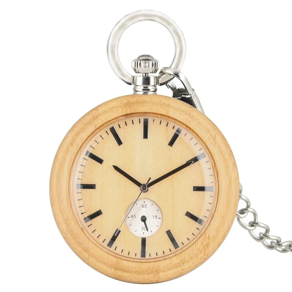 The Personalized Natural Minimalist Silver Bamboo Wood Pocket Watch Taschenuhr features black hour and minute hands, a small seconds dial, and a metal chain attached to the top.