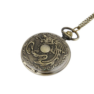 A vintage quartz pocket watch named "High Quality Cheap Vintage Dragon Engraved Quartz Old Pocket Watch Relojes Antiguos Bolsillo," featuring a dragon engraving on the cover and includes a matching chain.