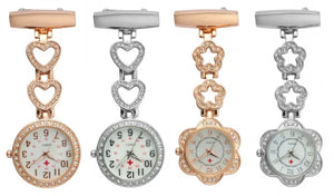 Four Alloy Metal Diamond Nurse Pocket Watches—two in rose gold and two in silver with jeweled heart or star chains—are lined up on a white background. These quartz watches are ideal accessories for doctors and nurses.