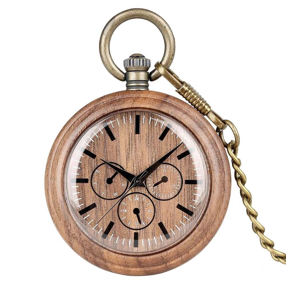 The Handmade Antique Vintage Pocket Watch is a custom bronze quartz walnut wooden pocket watch with black hour marks, three subdials, and a metal chain attached to the top.